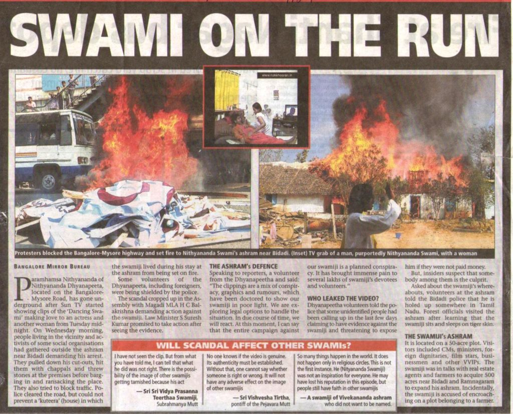 2010-03-04_BM_Swami on the run burning cars and houses (2)